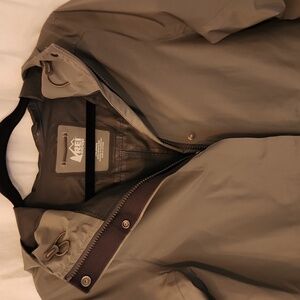 REI Women's long cinched waist rain jacket